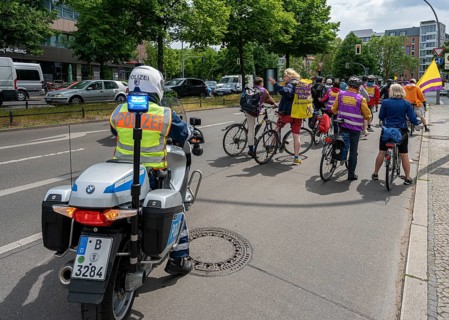 Berlin police escorting a bicycle parade on Kurfuerstendamm