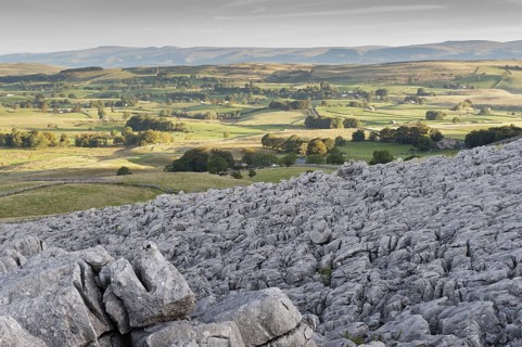View of limestone pavement at sunrise