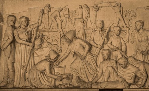Marble relief with the story of the Boer trek