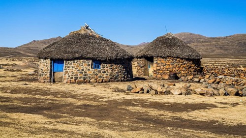 Huts on the high plateau at the Sani Pass
