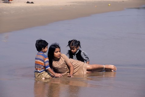 Children playing in Rishikonda beach in Visakhapatnam
