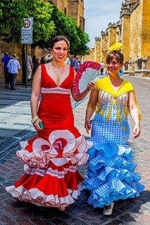 Women in flamenco costumes at the folk festival