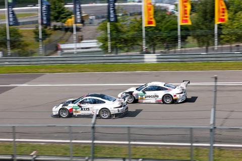 Two Porsche GT3s battle it out at Nuerburgring race track