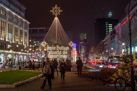 Kadewe from outside in the glow of lights. Christmas shopping on Tauentzien am Schoeneberg