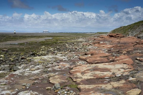 View over estuary with lighthouse