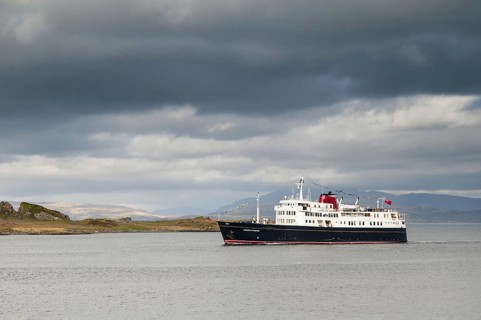 Cruise ship Hebridean Princess sails past the island on her way into Oban Harbour