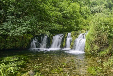 View of waterfall over limestone rocks