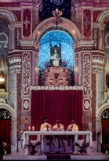 Priest preaching Santa Cruz Basilica in Fort Kochi