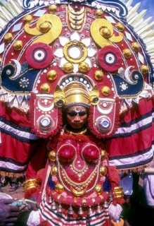 Theyyam dancer in Kavadiyattam in Athachamayam celebration in Thripunithura during Onam near Ernakulam