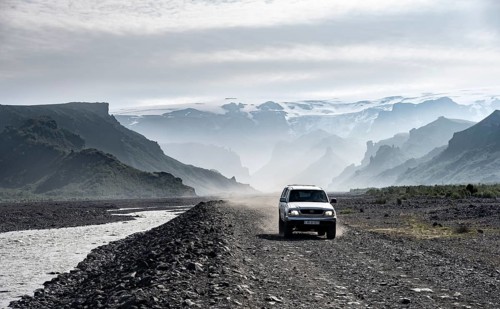 Off-road vehicle driving on a track