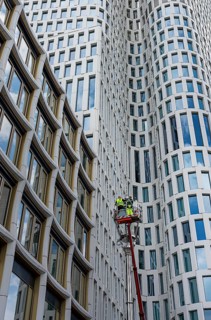 Maintenance work on the lantern in front of the Upper West high-rise