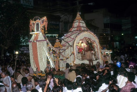 Goddess Meenakshi in a flower Palanquin going in a procession after her wedding