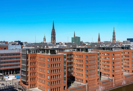 View from the Elbe Philharmonic Hall to the Michel and the office buildings at Sandtorhafen in Hafencity
