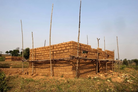House being built from mud bricks