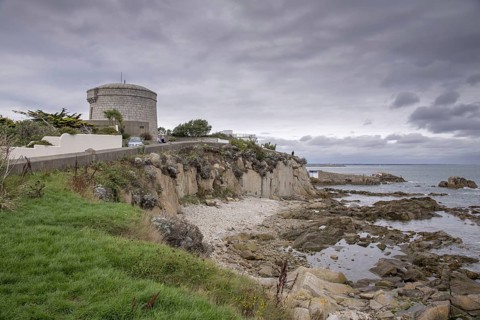 View of coastal promontory and Martello tower