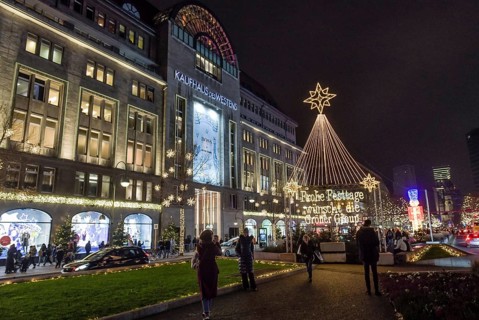 Kadewe from outside in the glow of lights. Christmas shopping on Tauentzien am Schoeneberg