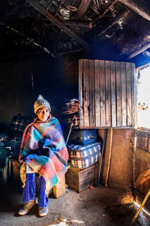 Woman in hut