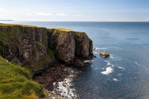 View of Torridonian red sandstone sea cliffs in northwest of island
