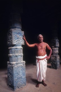 A Priest standing in Kampaheswarar Temple at Thirubuvanam