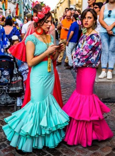 Women in flamenco costumes at the folk festival