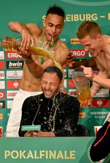 Beer shower for coach Domenico Tedesco