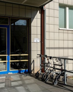 Rollator in front of the entrance to an apartment building in Berlin Mitte