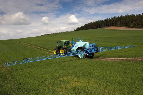 Tractor with sprayer
