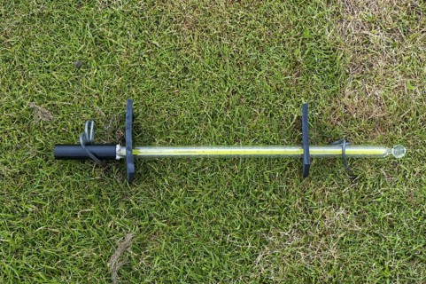 Thermometer on the garden surface measuring soil temperature