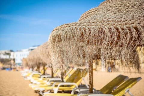 Straw umbrellas on the beach