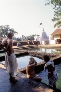 A ritual being performed at Kashi Bhageerathi theertha in Kadri Manjunath Temple