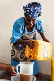 Woman making soap