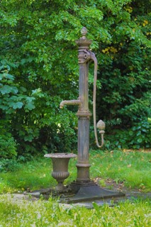 Old fountain with hand pump