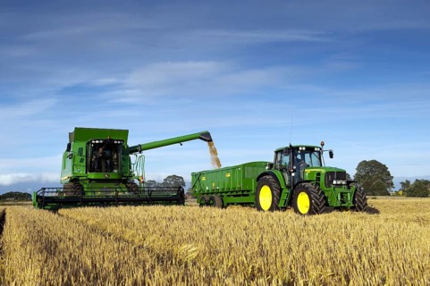 John Deere combine harvester harvesting barley