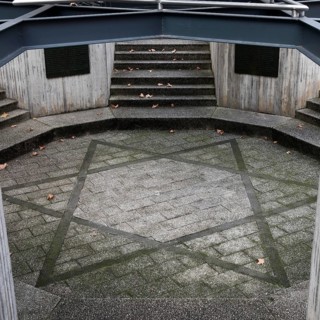 Memorial on the square of the Old Synagogue with the Star of David