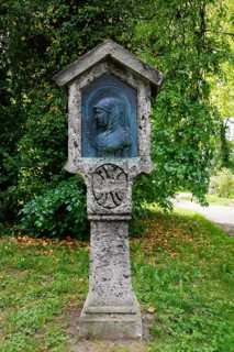 Stone stele with woman's face