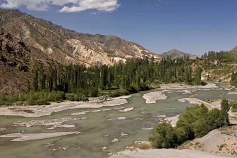 View of unspoilt river valley in area currently being heavily dammed