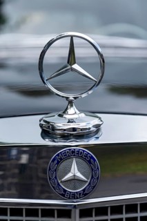 Radiator mascot Mercedes star with logo on classic car Mercedes-Benz 300 SEL Automatic