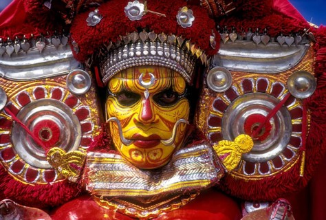 Theyyam dancer in Kavadiyattam in Athachamayam celebration in Thripunithura during Onam near Ernakulam