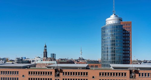 View from the Elbe Philharmonic Hall to the Columbiahaus and the Michel