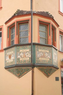 Ornate bay window with mural in Rheinbrueckenstrasse