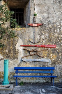 Wall decoration of nautical symbols on old house wall