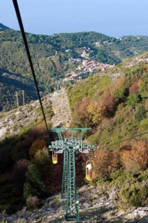 Cable car Cabinovia Monte Capanne with open standing gondola on Monte Capanne mountain