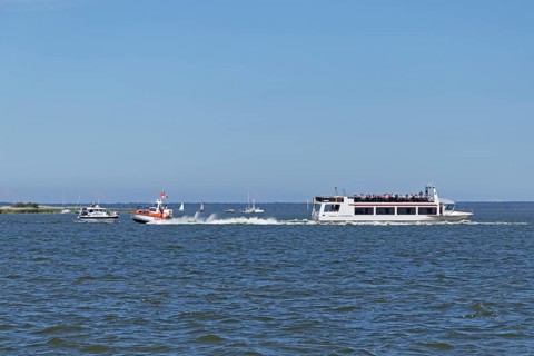 Excursion boat and other boats
