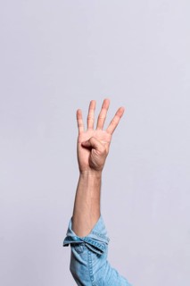 Hand counting number four