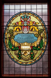 Leaded glass in the town hall shows the coat of arms of Hamburg and insignia of the former Hanseatic League