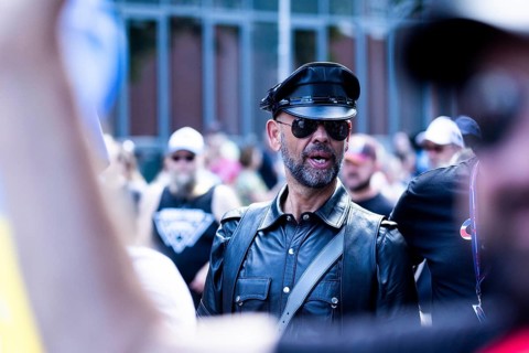 Homosexual men from the SM scene in martial leather clothing at the CSD parade