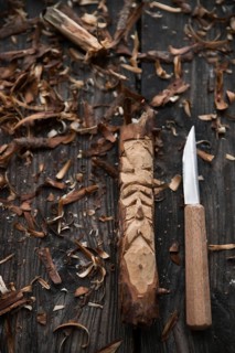 Carved face of an old man
