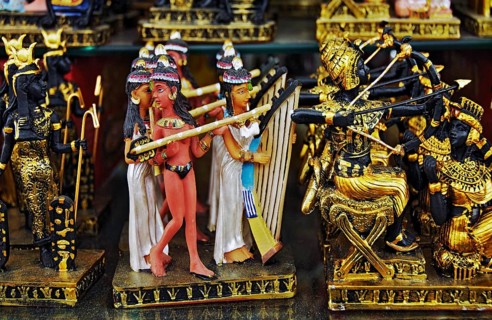 Figures of female musicians and archers as tourist kitsch at Hurghada airport