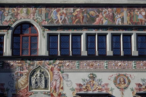 Old town hall in Gothic style with picture friezes