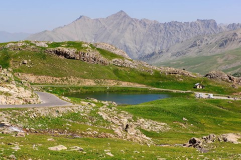 View of Lac des Eissaupres above tree line on Route Col de la Bonette